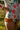 ARNICA CRUDO - ALANA LONGSLEEVE one-piece swimsuit with floral design and ruffled leg detail.