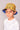 Boy wearing a yellow bucket hat with black spots and a long sleeve white rashguard swim shirt.